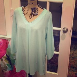 V-neck, pleat front pullover blouse